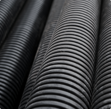 black-building-pipes-selective-focus-coated-corrugated-pipes-road-electrical-network-repair-top-view-reconstruction-improvement-social-infrastructure-cities